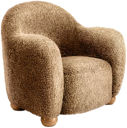 Rounded camel-coloured boucle lounge chair.